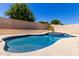 Beautiful pool and spa in a private backyard setting with lush greenery at 8500 W Saint John Rd, Peoria, AZ 85382
