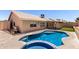 Inviting backyard pool with a built-in spa and covered patio at 8500 W Saint John Rd, Peoria, AZ 85382