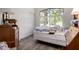 Bright room with ample closet space and light from a large arched window at 9575 S Ash Ave, Tempe, AZ 85284