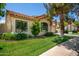 Lovely single-story home with a well-kept lawn, mature trees, and a tiled roof, offering curb appeal at 9575 S Ash Ave, Tempe, AZ 85284