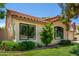 Attractive single-story home featuring large windows, manicured landscaping, and a well-maintained exterior at 9575 S Ash Ave, Tempe, AZ 85284