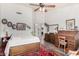 Spacious main bedroom with ceiling fan, walk-in closet and ensuite bathroom at 9575 S Ash Ave, Tempe, AZ 85284