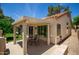 Relaxing covered patio with a dining set, providing an ideal outdoor living space and entertainment area at 9575 S Ash Ave, Tempe, AZ 85284