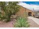 Charming home with desert landscaping and a welcoming entrance at 980 W Prior Ave, Coolidge, AZ 85128