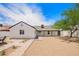 Picture of a house with desert landscaping, an extended patio, and stone pathway at 9855 S 47Th Pl, Phoenix, AZ 85044