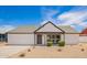 Charming single-story home with a well-manicured yard and appealing modern design at 9855 S 47Th Pl, Phoenix, AZ 85044