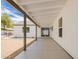 Covered patio with a concrete floor and view to the backyard at 9855 S 47Th Pl, Phoenix, AZ 85044