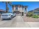 Exterior of home with desert landscaping, a spacious driveway, and an attached two-car garage at 9934 E Empress Ave, Mesa, AZ 85208