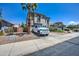 Exterior of home with desert landscaping, a spacious driveway, and an attached two-car garage at 9934 E Empress Ave, Mesa, AZ 85208