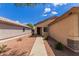 A well-maintained home entrance with desert landscaping, providing a welcoming curb appeal at 11139 W Devonshire Ave, Phoenix, AZ 85037