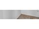 This is an empty room, with white walls, and a tan carpet at 11159 E Sebring Ave, Mesa, AZ 85212