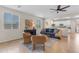 Inviting living room with neutral tones, tile flooring, and lots of natural light at 11159 E Sebring Ave, Mesa, AZ 85212