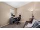 Bedroom provides space for desk and a seating area at 15231 W Melissa Ln, Surprise, AZ 85374