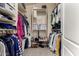 Spacious walk-in closet with built-in shelving and ample storage space at 15231 W Melissa Ln, Surprise, AZ 85374