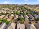 An aerial shot of a subdivision showing the rooftops of many homes at 154 W Hayden Park Rd, San Tan Valley, AZ 85143