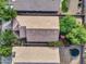 Rooftop view of a home with well-kept backyard, desert landscaping, and outdoor recreational equipment, offering Gathering enjoyment at 154 W Hayden Park Rd, San Tan Valley, AZ 85143