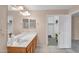 Bathroom vanity and walk in closet at 154 W Hayden Park Rd, San Tan Valley, AZ 85143