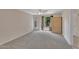 Bedroom featuring neutral carpet and large window with natural light at 154 W Hayden Park Rd, San Tan Valley, AZ 85143