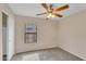 Neutral bedroom with a window and closet at 154 W Hayden Park Rd, San Tan Valley, AZ 85143