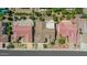 Aerial view of the property showcasing the roof, desert landscaping, and neighborhood layout at 15539 W La Salinas Ln, Surprise, AZ 85374