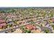 Aerial view of a desert home in a well-planned community close to golf courses at 15539 W La Salinas Ln, Surprise, AZ 85374