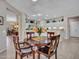 Inviting dining area with views of the kitchen at 15539 W La Salinas Ln, Surprise, AZ 85374