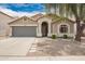 Charming single-story home with a well-maintained front yard, neutral tones, and attached two-car garage at 1707 W Stanford Ave, Gilbert, AZ 85233