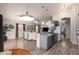 Open-concept living space connecting the kitchen to the living area, creating a welcoming and social atmosphere at 1707 W Stanford Ave, Gilbert, AZ 85233