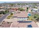 Sprawling single-story home boasts a private pool, tile roof, and solar panels in a desert community at 18036 W San Miguel Ave, Litchfield Park, AZ 85340