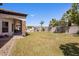 Expansive backyard with lush green grass, outdoor seating, and mountain views at 18036 W San Miguel Ave, Litchfield Park, AZ 85340