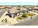 Charming single Gathering home featuring stone accents, tile roof, desert landscaping and circular driveway at 18036 W San Miguel Ave, Litchfield Park, AZ 85340