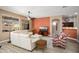 Bright living area showcasing a neutral color palette, wood floors, and stylish furnishings at 18242 W Stinson Dr, Surprise, AZ 85374