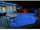 Outdoor pool view featuring colored lighting and a concrete deck at 18242 W Stinson Dr, Surprise, AZ 85374