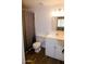 Bathroom featuring wood flooring, newer toilet and vanity at 2144 E Center Ln # 3, Tempe, AZ 85281