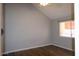 Light filled bedroom with ceiling fan and wood look floors at 2144 E Center Ln # 3, Tempe, AZ 85281