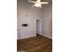 Bedroom features ceiling fan, wood-look floors and tv mount at 2144 E Center Ln # 3, Tempe, AZ 85281