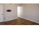 Bedroom with hardwood floors, ceiling fan, and white trim at 2144 E Center Ln # 3, Tempe, AZ 85281