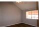 Bright bedroom with ceiling fan and wood look floors at 2144 E Center Ln # 3, Tempe, AZ 85281