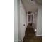 Hallway features new flooring, multiple linen closets and recessed lighting at 2144 E Center Ln # 3, Tempe, AZ 85281