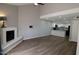Spacious living room with fireplace and seamless access to the updated kitchen at 2144 E Center Ln # 3, Tempe, AZ 85281