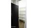 Convenient pantry with ample storage shelving and modern appliances at 2144 E Center Ln # 3, Tempe, AZ 85281