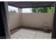 Private patio with tile floor, stucco wall and pergola at 2144 E Center Ln # 3, Tempe, AZ 85281