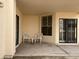Covered back patio featuring neutral paint and a seating area at 2169 E Bishop Dr, Tempe, AZ 85282
