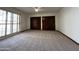Bedroom with neutral carpet, a ceiling fan, and a closet at 2169 E Bishop Dr, Tempe, AZ 85282