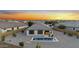 This home has a backyard with a small pool, rock landscaping and a covered patio at 21797 N 259Th Ave, Buckeye, AZ 85396