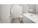 Bright bathroom with a large vanity and shower offers a clean and functional space, perfect for everyday use at 21797 N 259Th Ave, Buckeye, AZ 85396