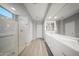 Spacious bathroom with a large vanity, sleek glass shower, and tile flooring offers both style and functionality at 21797 N 259Th Ave, Buckeye, AZ 85396