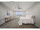 Bedroom with neutral walls, carpet flooring, and a ceiling fan at 21797 N 259Th Ave, Buckeye, AZ 85396