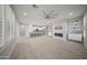 The floorplan is open with wood-look floors and a large island with seating at 21797 N 259Th Ave, Buckeye, AZ 85396