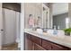Bathroom with wooden vanity, sink, mirror, and a shower with curtain at 2255 N Hillridge --, Mesa, AZ 85207